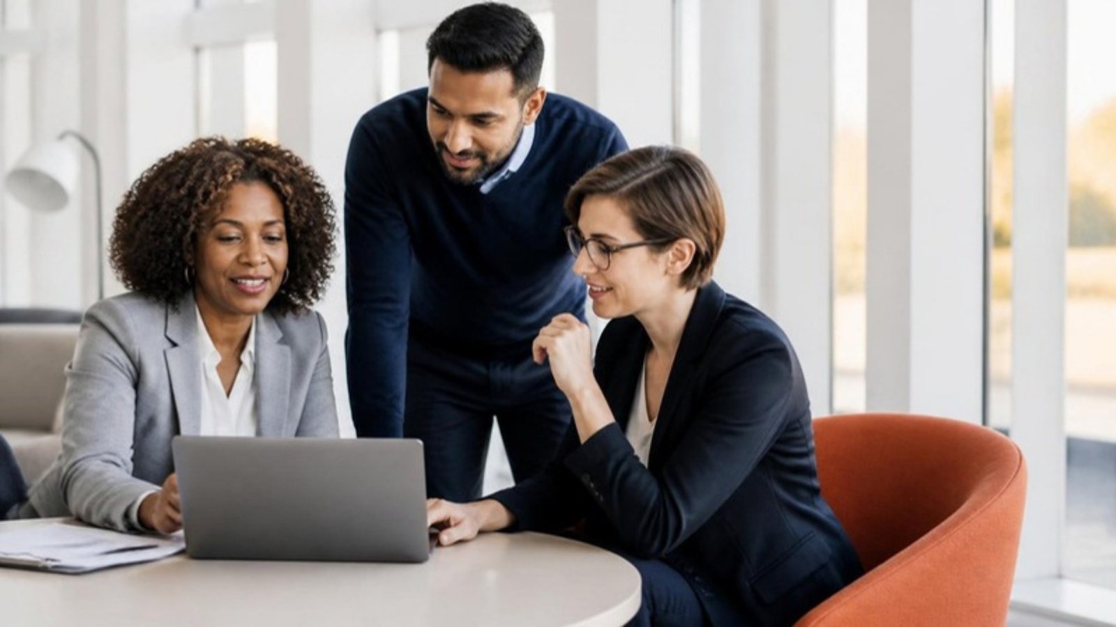 NexSolv team members collaborating in a bright office